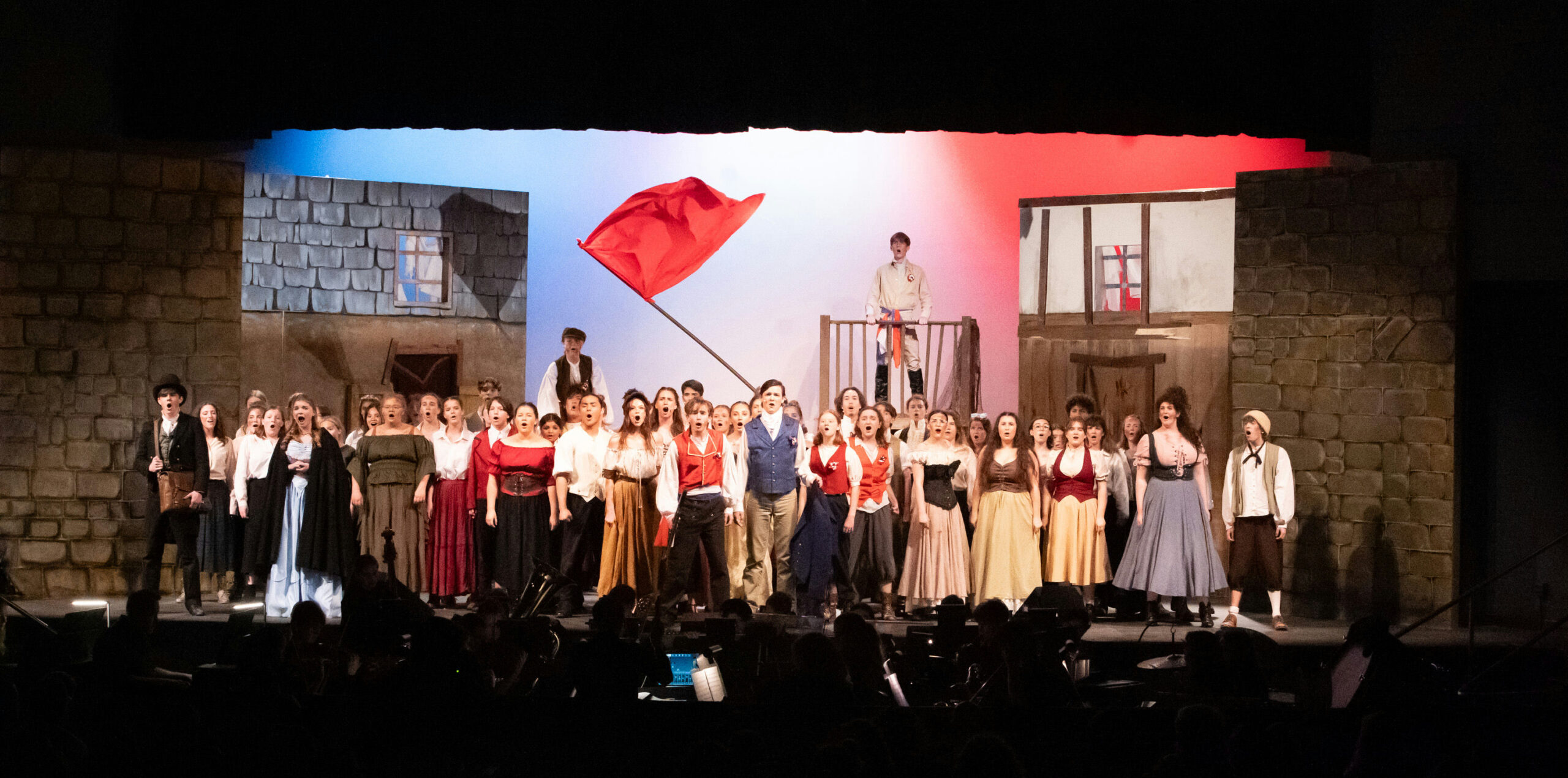 YHS cast onstage for "Les Miserables"